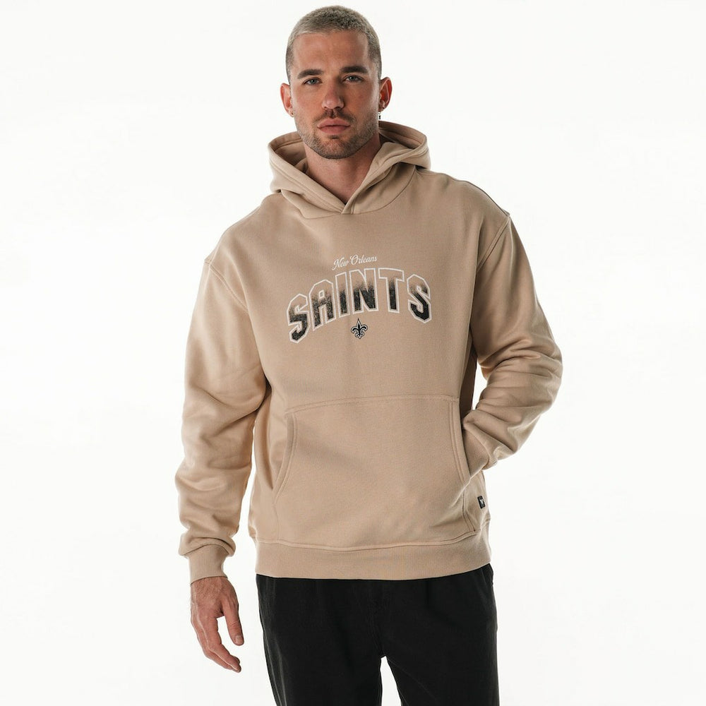 New Orleans Saints The Wild Collective Unisex Oversized Graphic Fleece Hoodie Tan | NFL