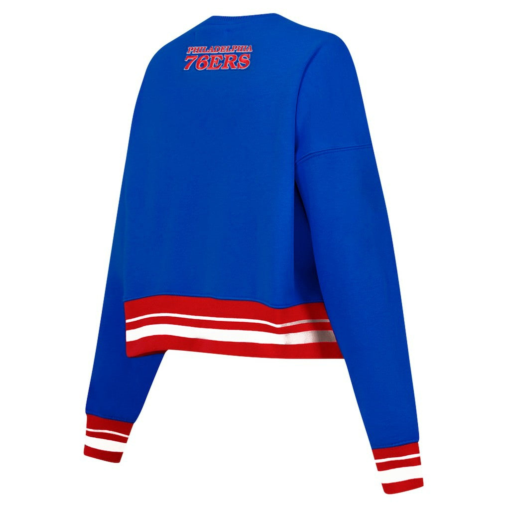 Philadelphia 76ers Pro Standard Women's Area Code Cropped Pullover Sweatshirt Royal - NBA