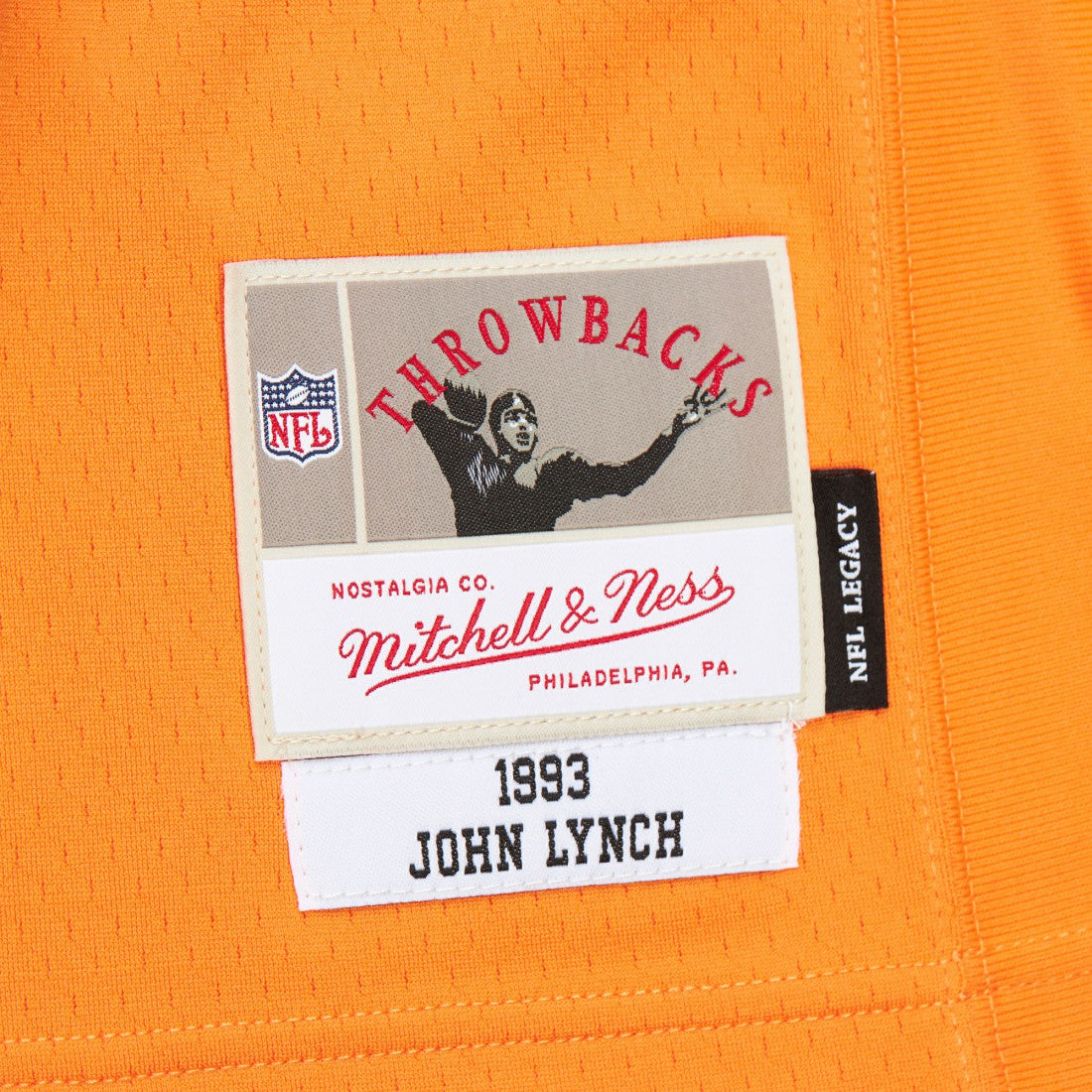 John Lynch Tampa Bay Buccaneers 1993 Legacy Replica Jersey Orange | Mitchell & Ness