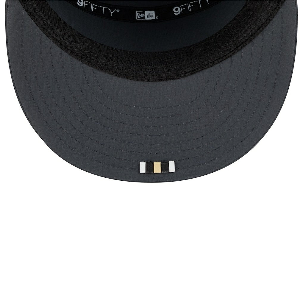 New Orleans Saints New Era 2025 Sideline Cold Weather Split Panel 9FIFTY Snapback Hat Charcoal | NFL