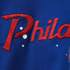 Philadelphia 76ers Women's Courtside Splatter Cropped T-Shirt Royal - NBA